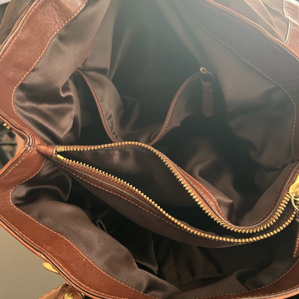 Coach Hampton Leather Carryall 15404
Brown Leather Handbag with Gold Accents - Picture 12 of 16